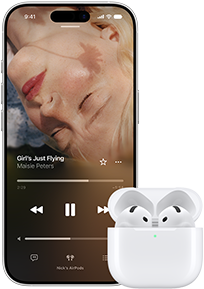 iPhone next to AirPods in charging case, case is open