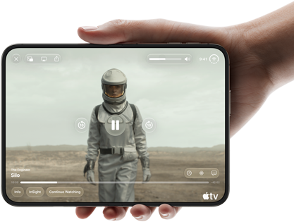 iPhone&nbsp;Duo, held with one hand, opened in horizontal orientation, fully unfolded, interior screen displays Apple&nbsp;TV show &ldquo;Silo&rdquo;