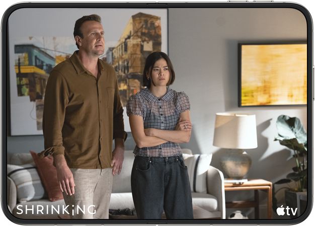 iPhone&nbsp;Duo, opened in horizontal position, Apple&nbsp;TV show &ldquo;Shrinking&rdquo; plays on screen